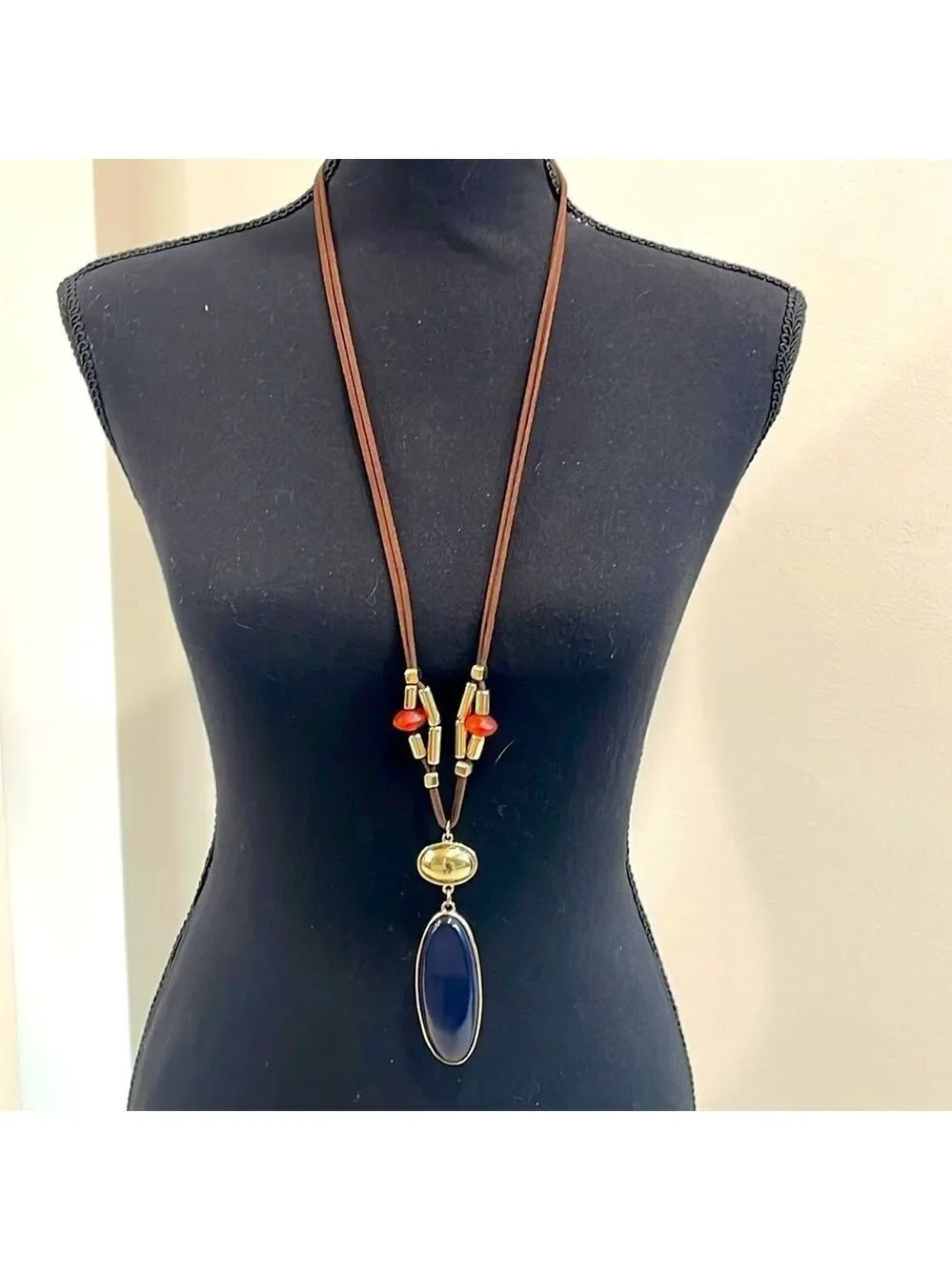 Chico’s leather long beaded necklace with gold and navy blue pendant